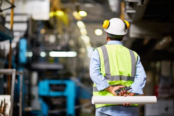 depositphotos_115720856-stock-photo-foreman-with-walkie-talkie-and