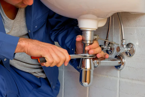 depositphotos_69797965-stock-photo-plumber-at-work